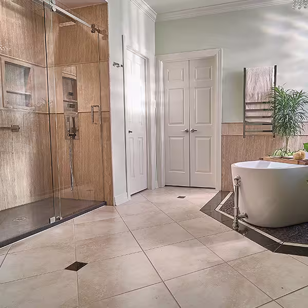 Freestanding tub with warm travertine surround
