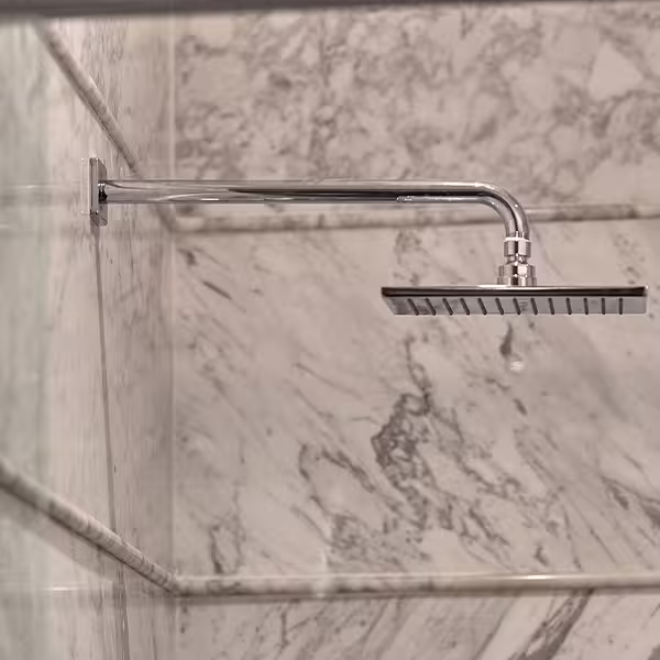Modern raincan shower in white marble